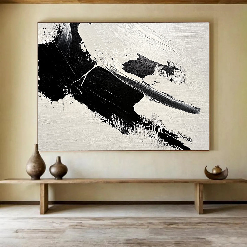 Large abstract painting featuring bold brushstrokes and textured areas of black and gray on a minimalist white background.SC574