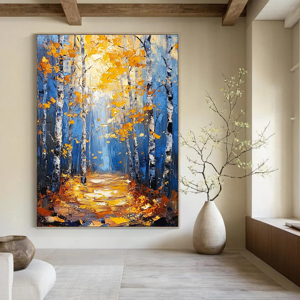 Large abstract painting of birch trees in autumn featuring blue and gold tones with textured background and tranquil atmosphere of sunlight filtering through branches.STSC870