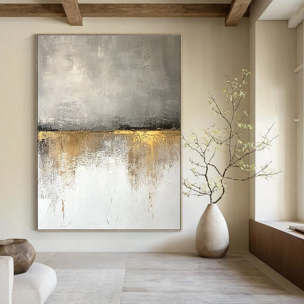 Large abstract painting featuring beige and gray tones with textured wall, golden accents, and a neutral color palette reflecting nature's beauty.STSC410