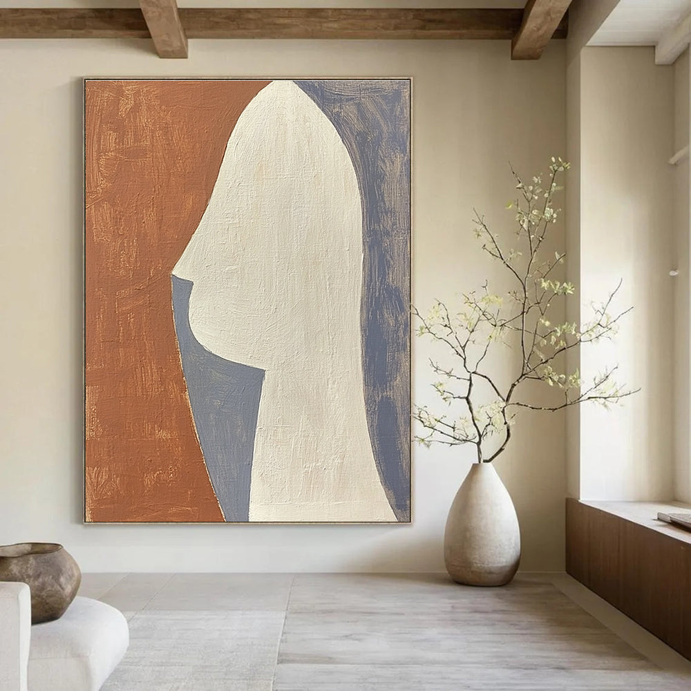 Large abstract painting featuring a profile design in terracotta white and grey composed of simple shapes.STSC1370