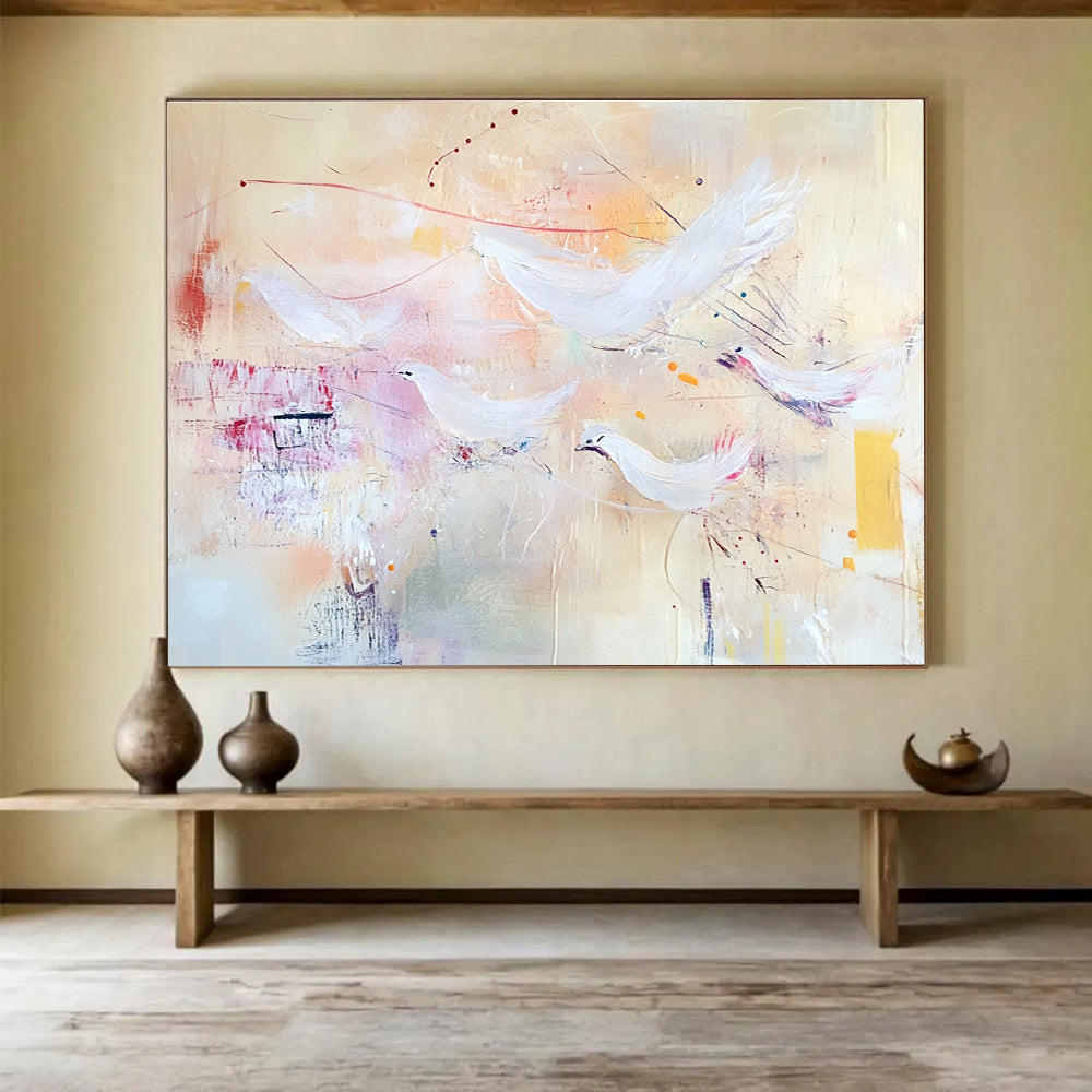 Large abstract painting with soft pastels featuring flying birds and textured layers evoking freedom and movement against a warm beige background.SC385