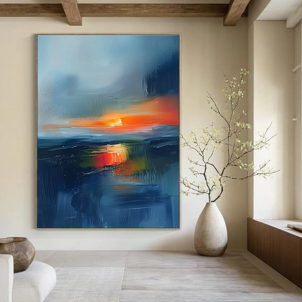 Large abstract painting featuring an Irish landscape at sunset with blue and orange tones and atmospheric clouds for a stunning visual impact.STSC149