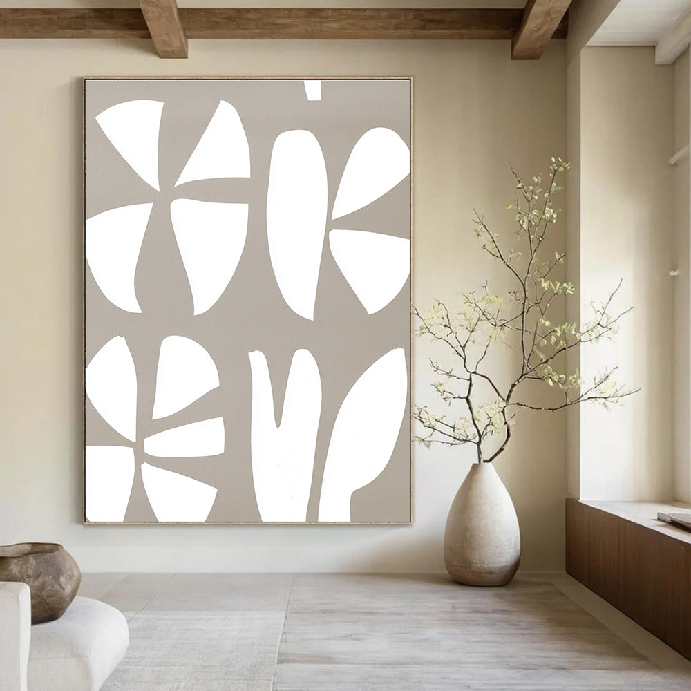 Large abstract painting featuring a white and gray pattern of the number three and two large flowers on a light brown background.STSC1240