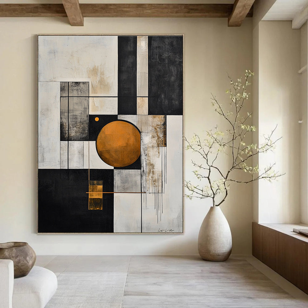 Large abstract painting in black and white with an orange circle and geometric shapes features a gray line and exquisite details on textured canvas.STSC207