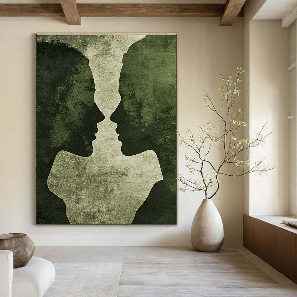 Abstract artwork featuring minimalistic male and female silhouettes in vintage green tones with grunge texture and deep shadows on a dark grey background.STSC1446