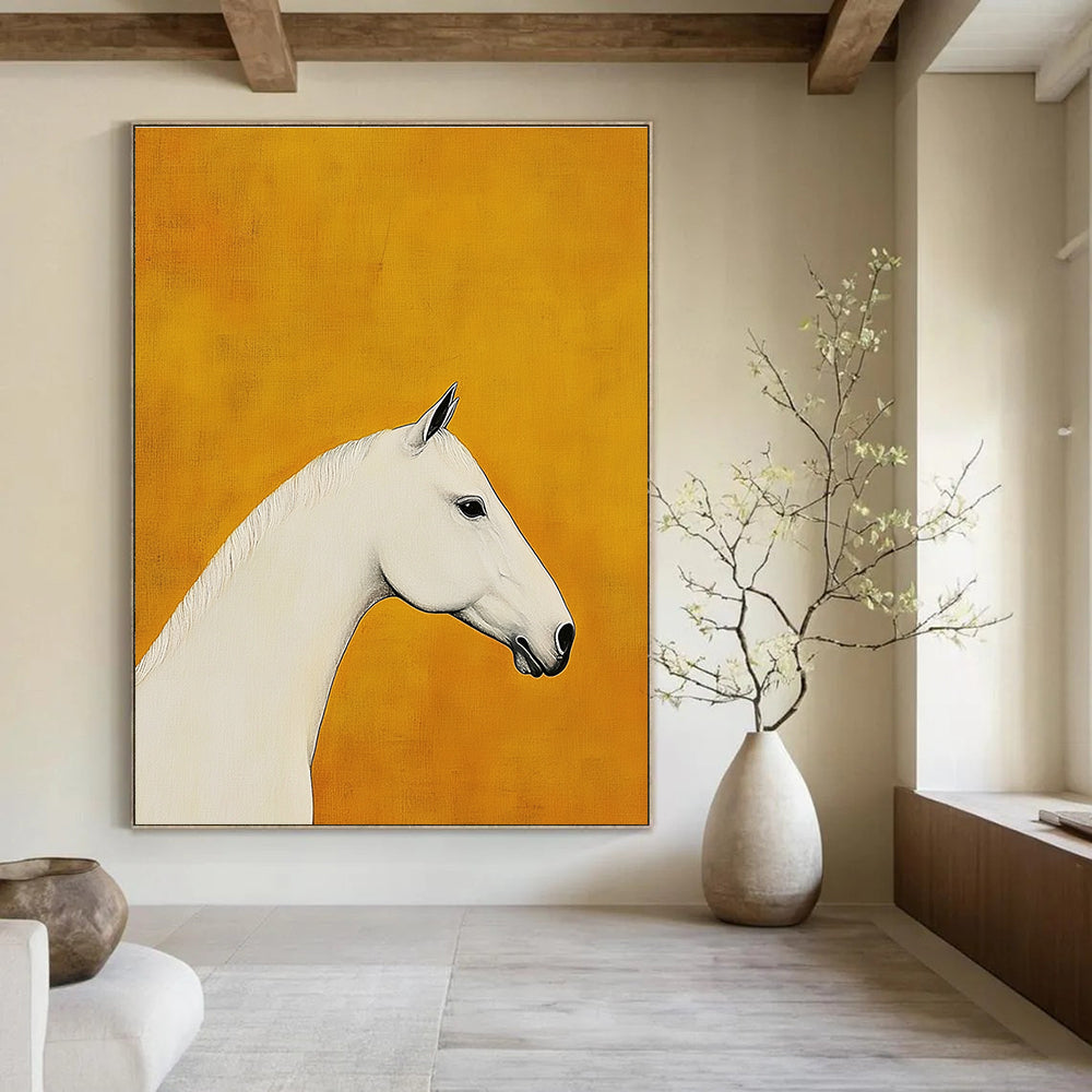 A large abstract painting featuring a white horse's head and neck profile on a mustard yellow background with soft lighting highlighting its silhouette.STSC1090