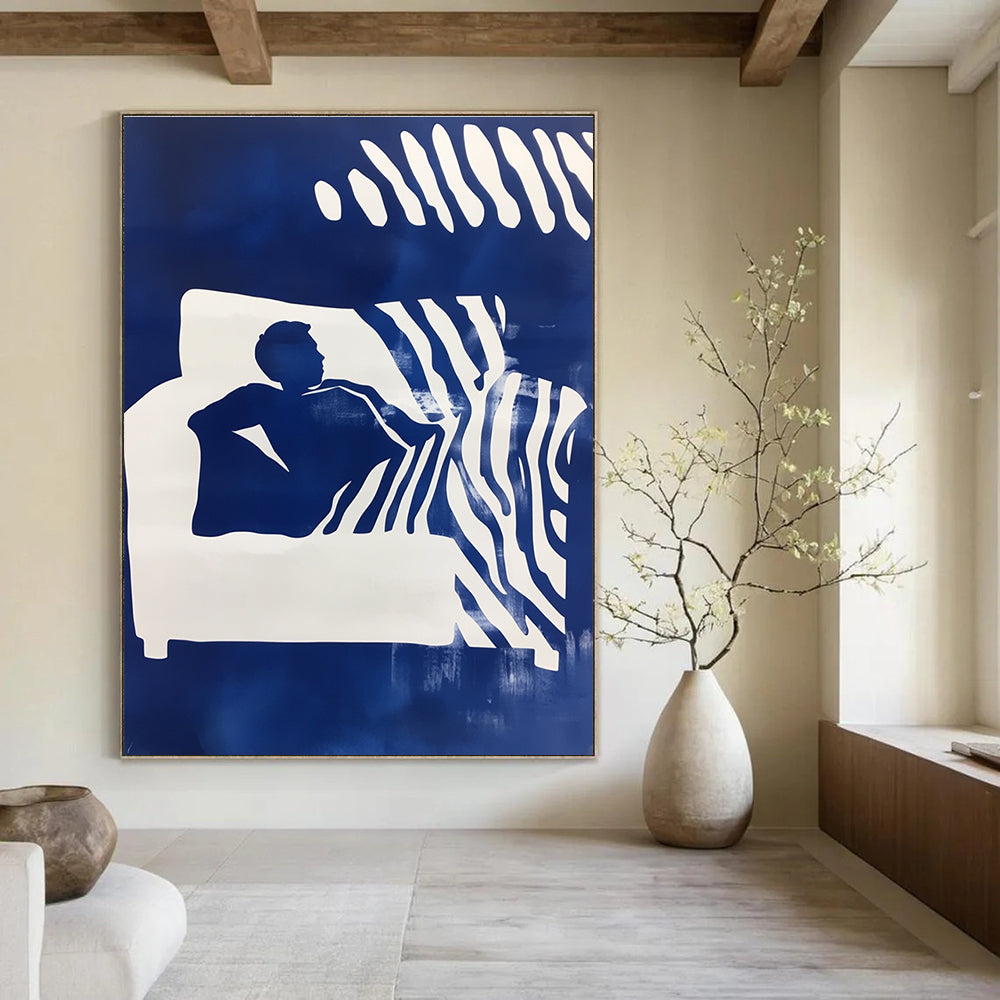 Abstract art featuring a man on a couch with blue and white stencil print and a zebra pattern background in a striking double exposure effect.STSC1210