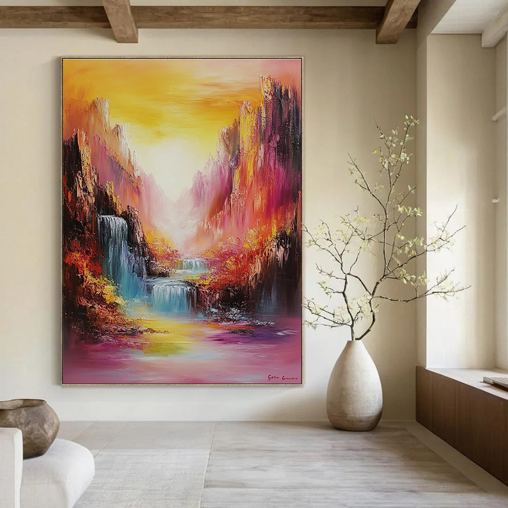 Large abstract oil painting featuring vibrant mountains and waterfalls in rainbow colors with bold brush strokes and a dreamy golden hour landscape.STSC1374