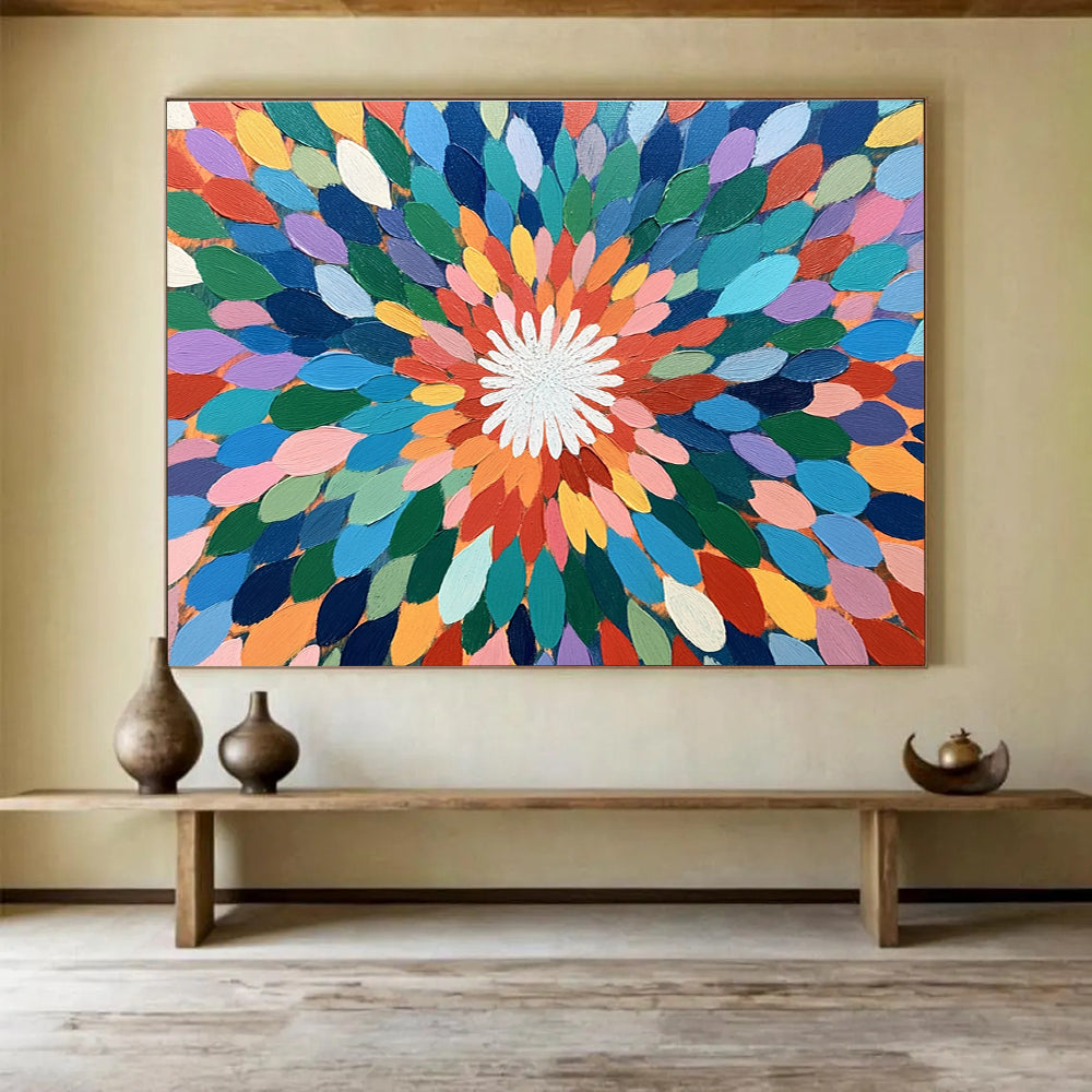 A large abstract painting featuring colorful overlapping petals in shades of green, blue, pink, orange, yellow, and purple with a vibrant center.SC526