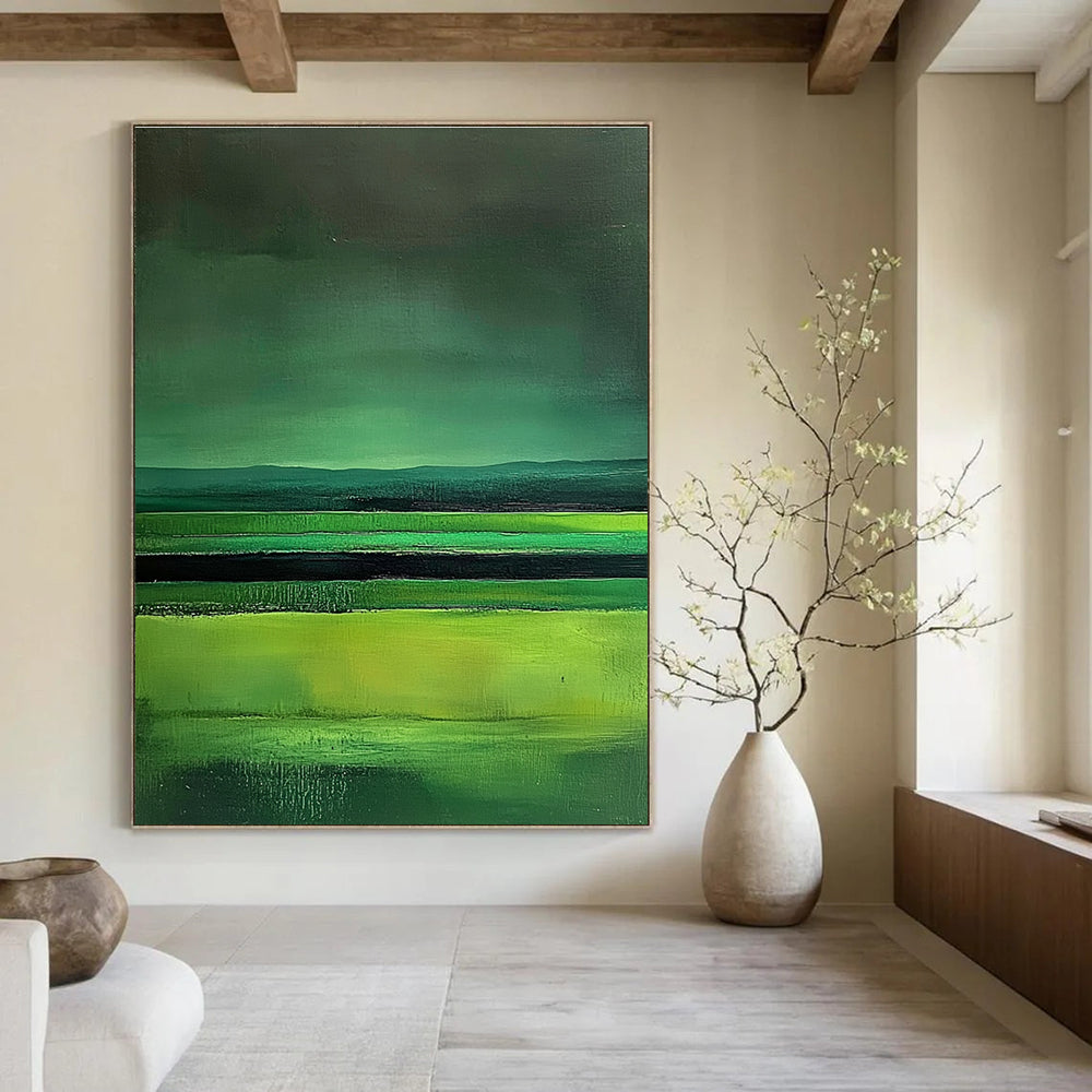 Large abstract painting featuring green fields dark sky and lake in a minimalist style with fluid lines inspired by Mark Rothko.STSC309