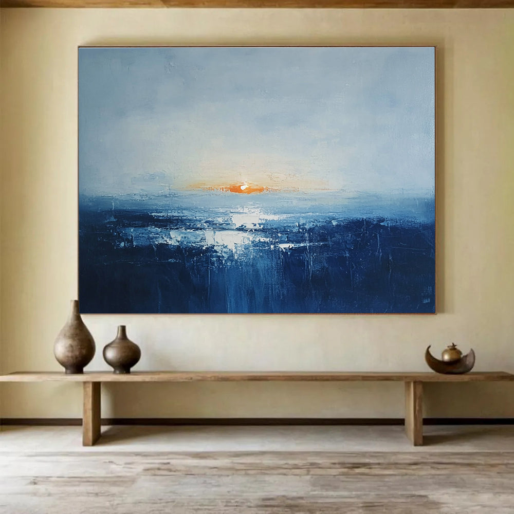 Abstract oil painting of an Irish landscape at sunrise featuring muted colors dark blue sea and an orange sun peeking over a grey skySC106