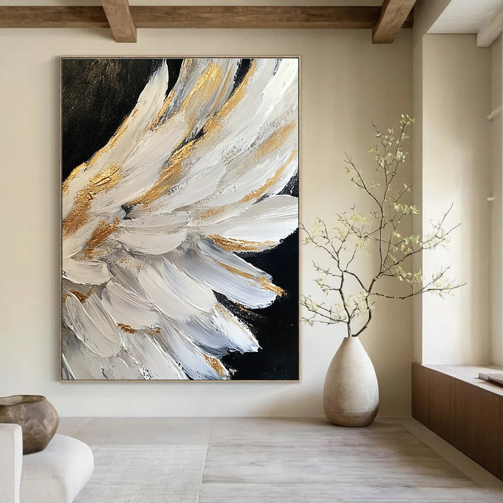 Large abstract painting of white angel wings with gold accents on a black background featuring heavy brush strokes and palette knife work.STSC006