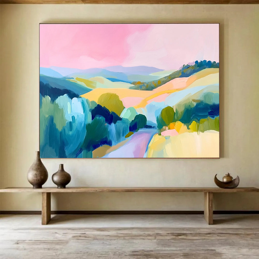 Large abstract painting of the French countryside featuring rolling hills a pink sky and vibrant blue green and yellow brush strokes.SC129