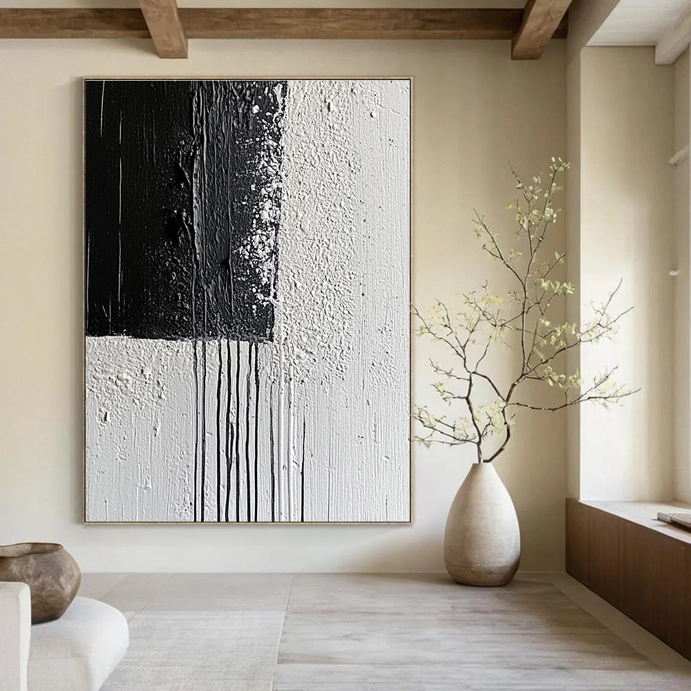 Large abstract painting with broad strokes and delicate paint drips on a textured canvas featuring a monochromatic gray color scheme.STSC539