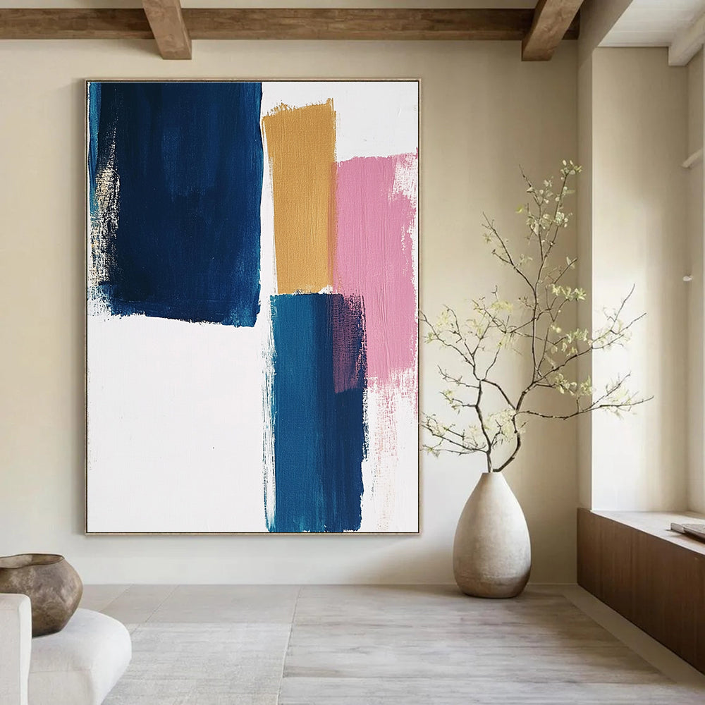Large abstract painting featuring thick brush strokes on a white background with blocks of blue mustard and pastel pink colors.STSC1343