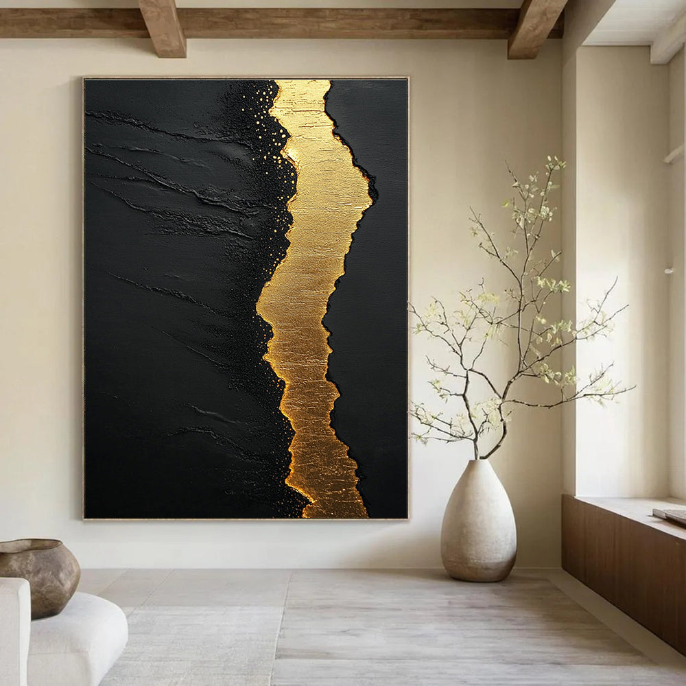 Large abstract painting featuring textured black sand golden water and white clouds with flowing golden light in a minimalist style against a dark background.STSC304