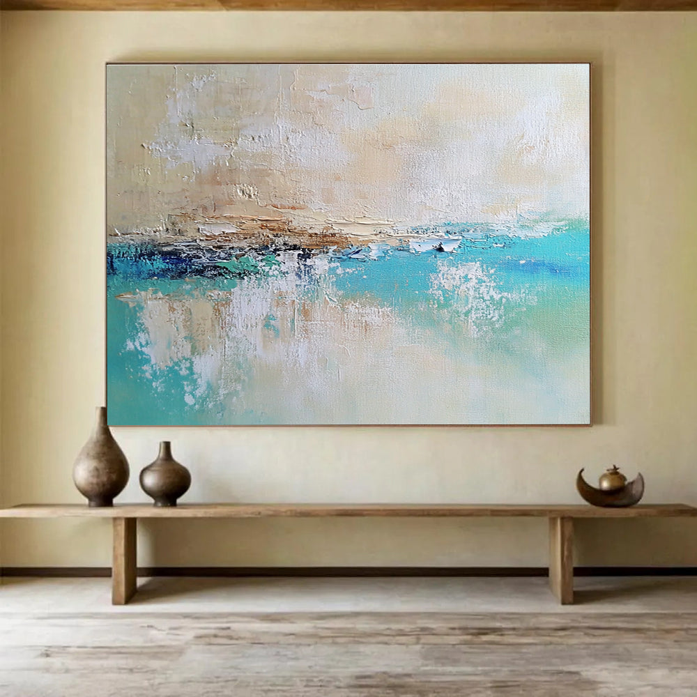 Large abstract painting of a calm sea featuring blue and green tones on a textured canvas with soft edges and neutral colors.SC340
