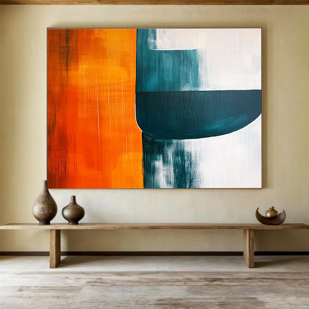 Large abstract painting featuring orange teal and grey shapes on a white background with negative space enhancing visual depth and minimalist style.SC249