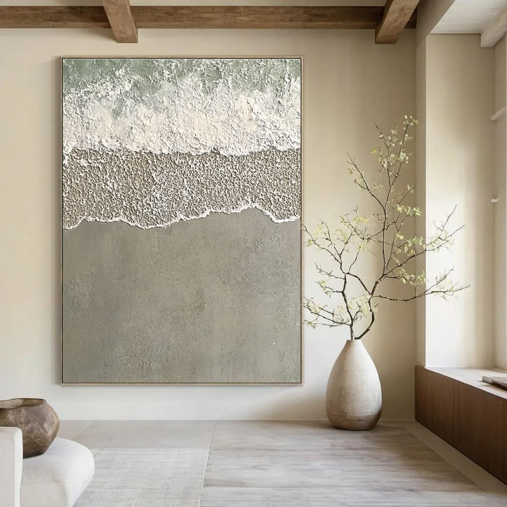 Large abstract painting depicting serene water and sand with textured wave patterns in light green and grayish-white tones.STSC1136