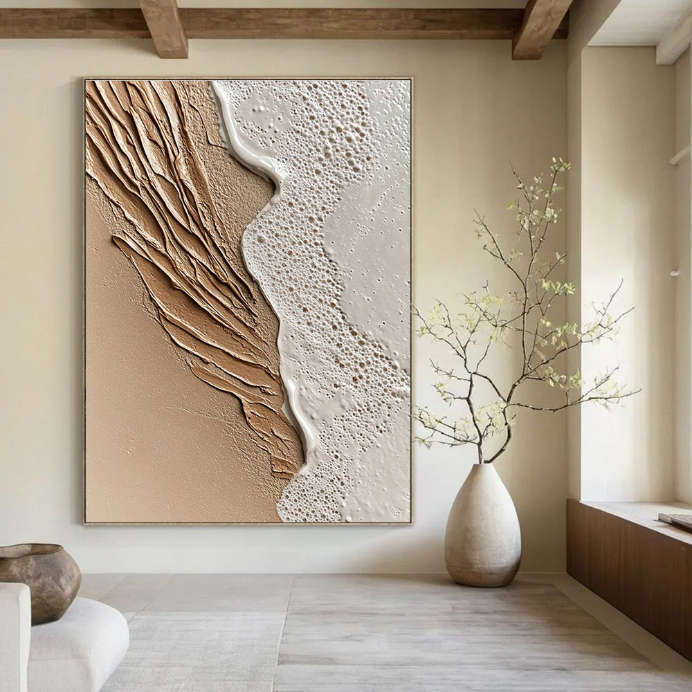 An abstract painting capturing close-up sand and serene waves at sunset featuring intricate details and a soothing beige color scheme.STSC943