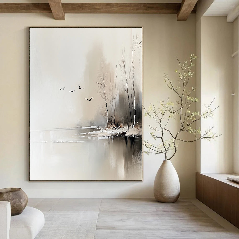 Large abstract painting depicting trees by an icy lake with flying birds, featuring neutral colors and delicate textures in a serene minimalist style.STSC105