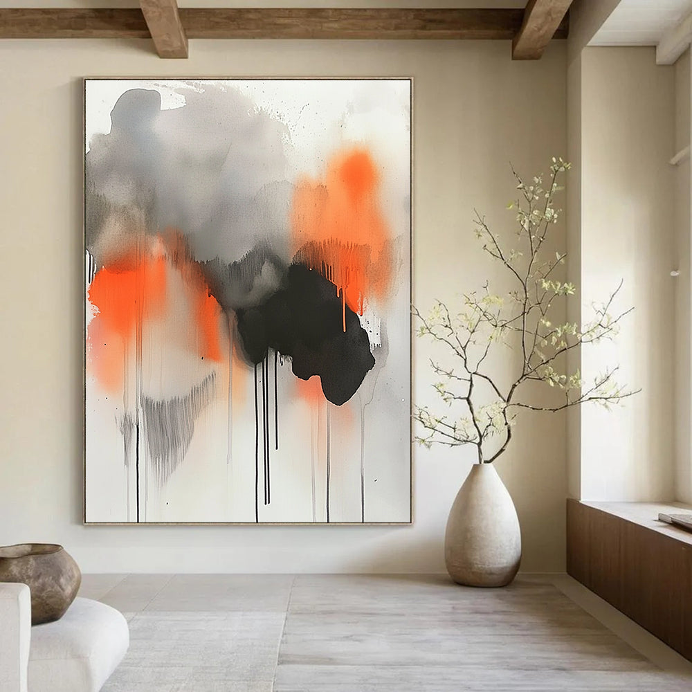 Large abstract painting featuring gray orange and black paint drips with watercolor clouds and smoke elements for a striking visual impact.STSC758