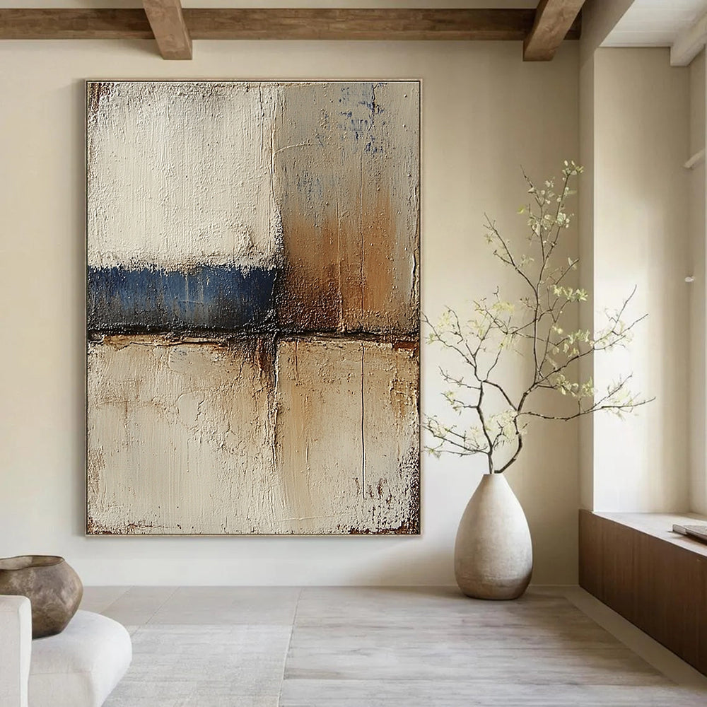 Abstract landscape with neutral colors in earth tones of beige and brown accented by blue textured paint ideal for modern decor.STSC079