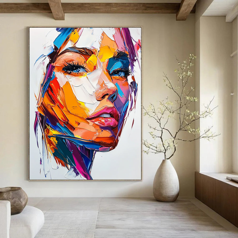 Large abstract painting of a woman's face featuring vibrant colors bold brush strokes and intense emotion on a white background.STSC457