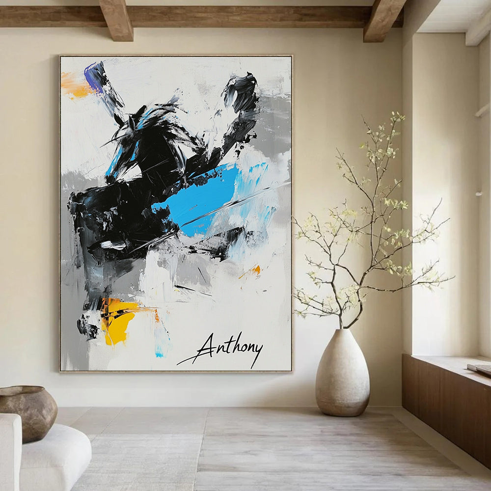 Large abstract painting featuring "Anthony" in black white and blue with a dynamic horse and signature Michael in the corner.STSC349