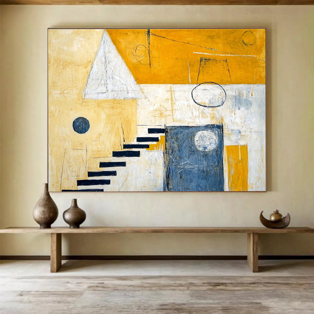 A large abstract painting featuring yellow and white hues, stairs leading to the sky, geometric shapes, and contrasting circles and squares.SC392