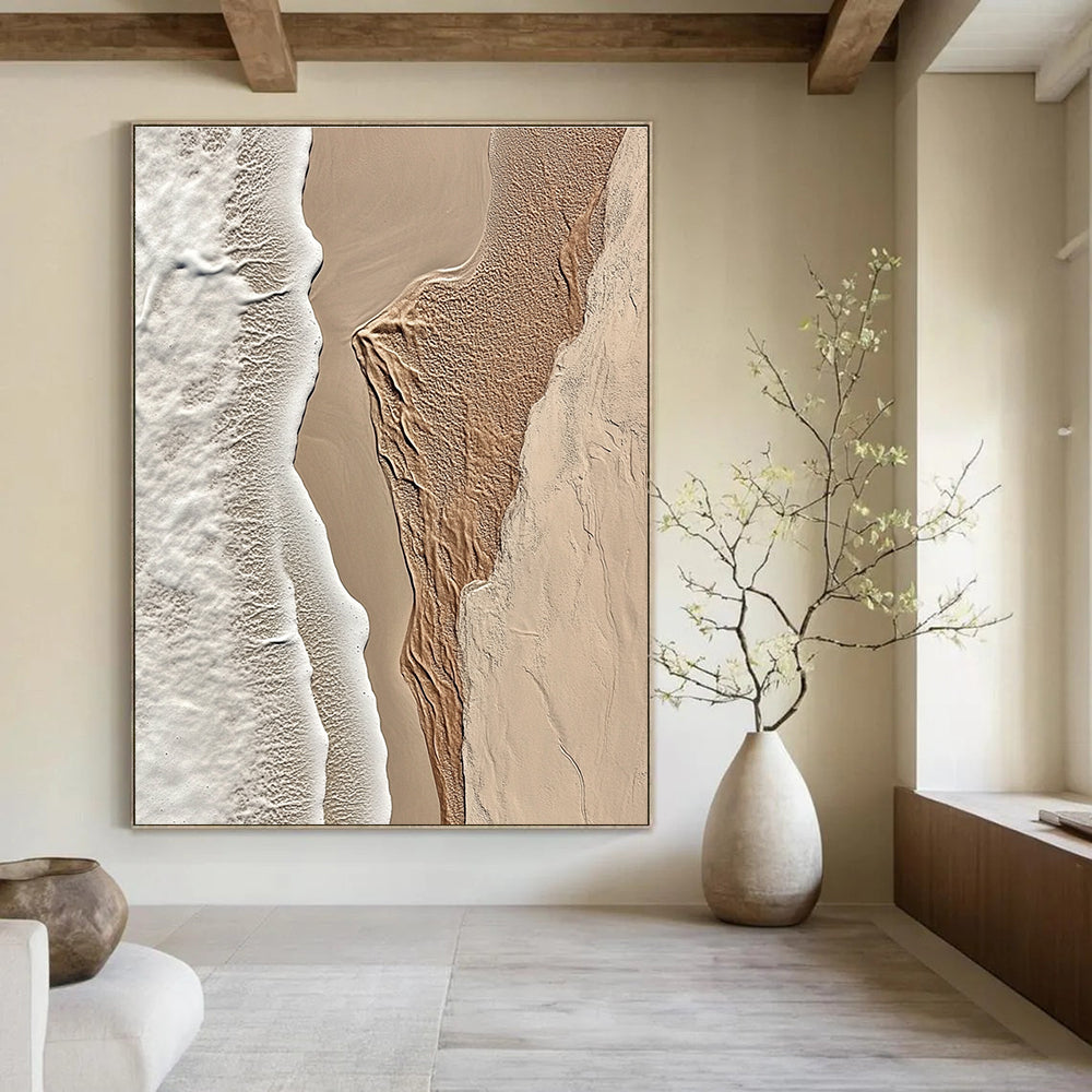 A large abstract painting featuring intricate textures of beige sand and white waves capturing the tranquility of coastal landscapes.STSC1294