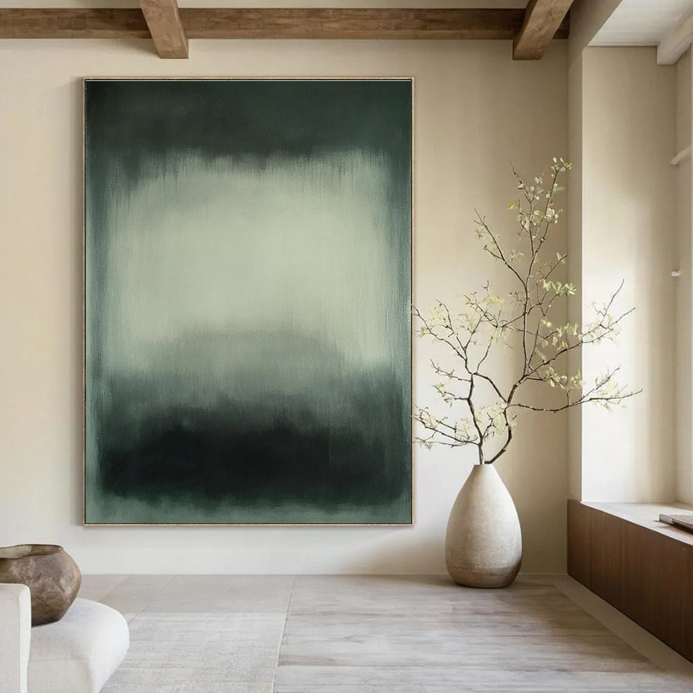 Large abstract painting featuring gray and white hues with blurred edges and a dark green gray background in a soft hazy atmospheric style.STSC683