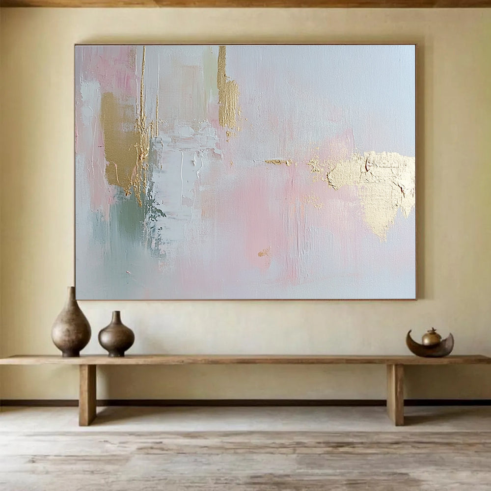 Abstract painting in soft pastel pink and pale gold with delicate brush strokes and textured elegance, enhancing a serene romantic atmosphere.SC386