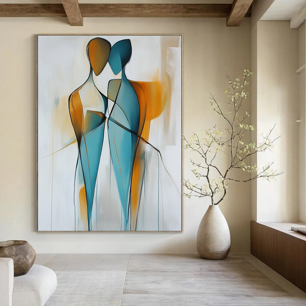 Large abstract painting featuring two figures in light blue and amber hues with smooth lines and golden details on a light gray background.STSC714