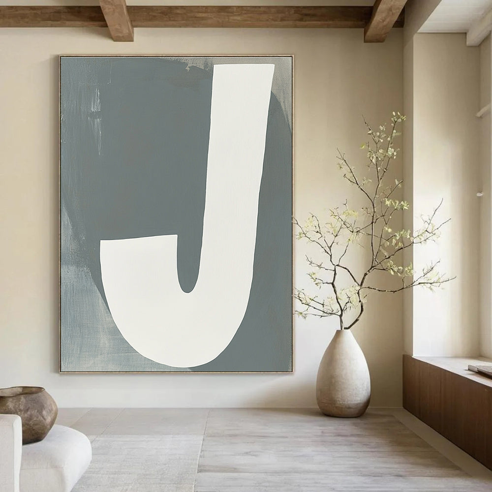 Large abstract painting featuring white and gray tones resembling a J with a neutral background promoting calmness and modern elegance.STSC1113