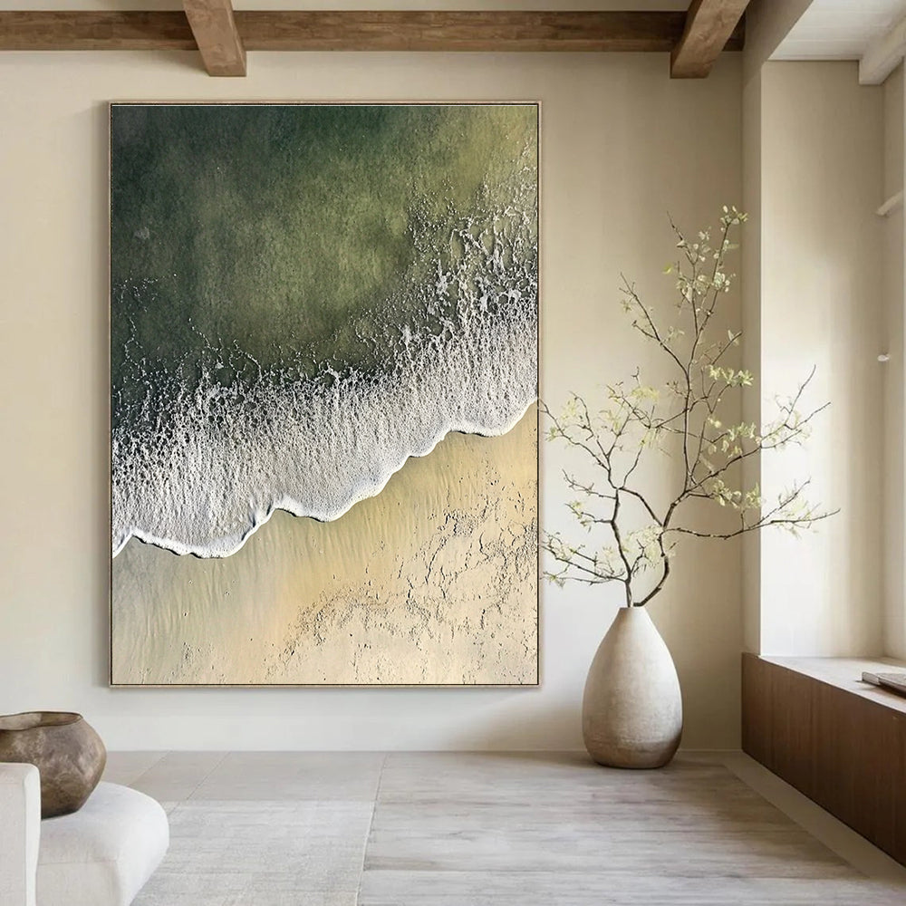Abstract painting depicting a serene coastal scene with gentle waves and soft sandy textures, blending white and gray with distant green sea hues.STSC1431