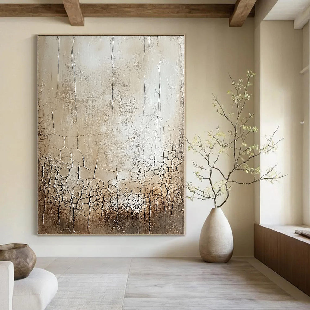 Large abstract painting featuring a blank canvas with a delicate white glaze showcasing random cracks and swirls in beige and gray shades.STSC292