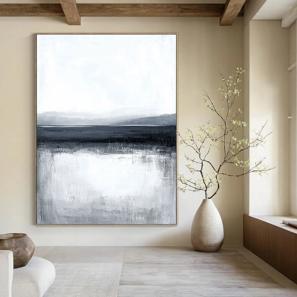 Large abstract painting featuring a serene water landscape with a gray sky and subtle brush strokes creating a calm minimalist design.STSC124
