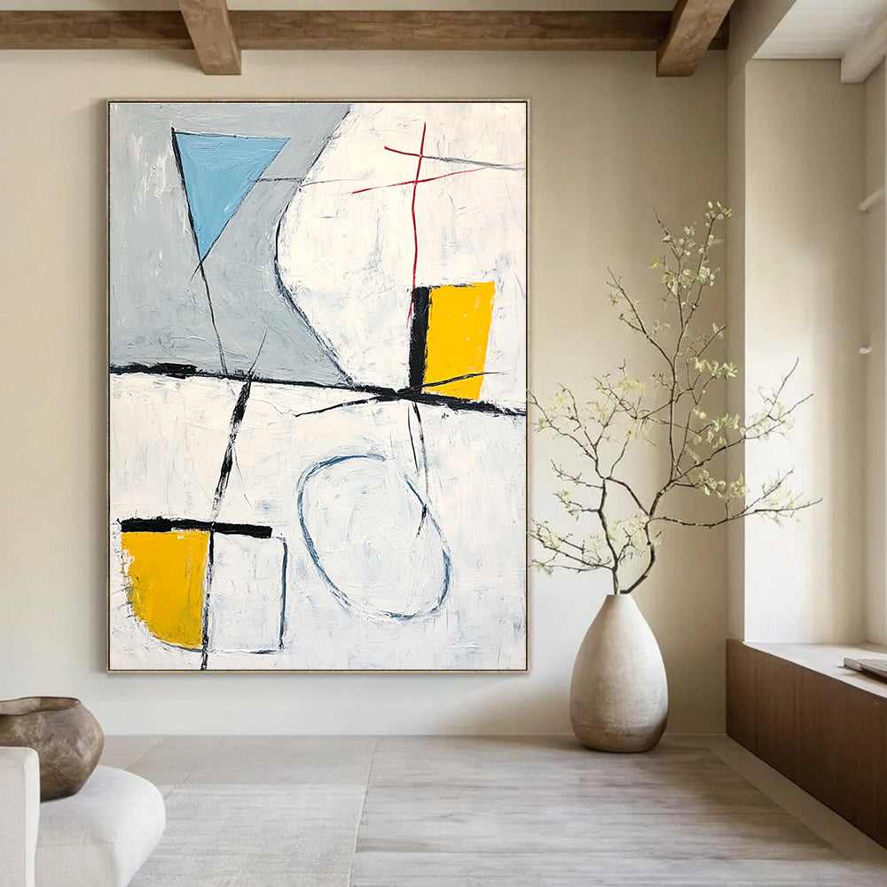 Large abstract painting featuring gray white and yellow shapes with a blue line connecting corners and black brush strokes.STSC612