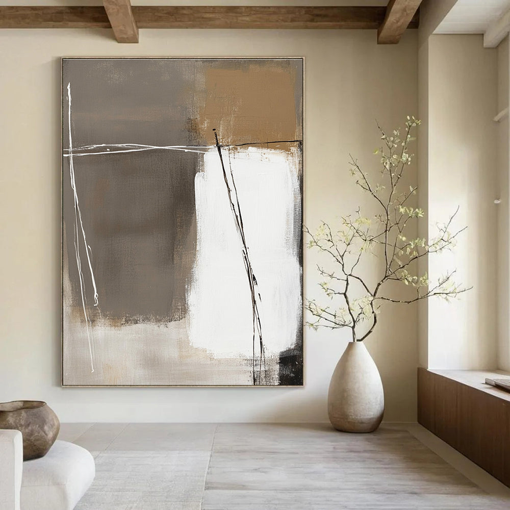 Large abstract painting in white and beige with brown accents on a dark gray background featuring thick brush strokes and hand-drawn lines.STSC564