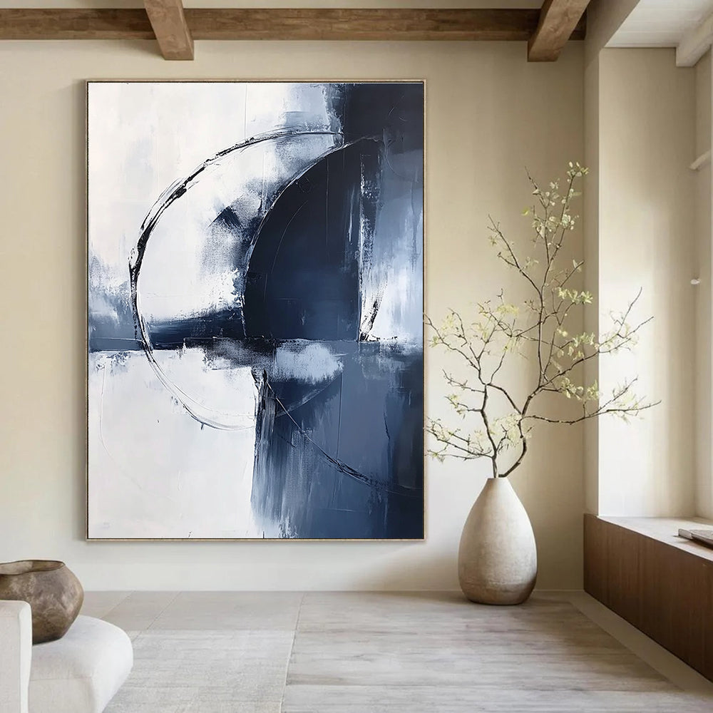 Large abstract painting in light navy and white tones featuring bold brushstrokes and an elegant minimalist style for sophisticated decor.STSC1355