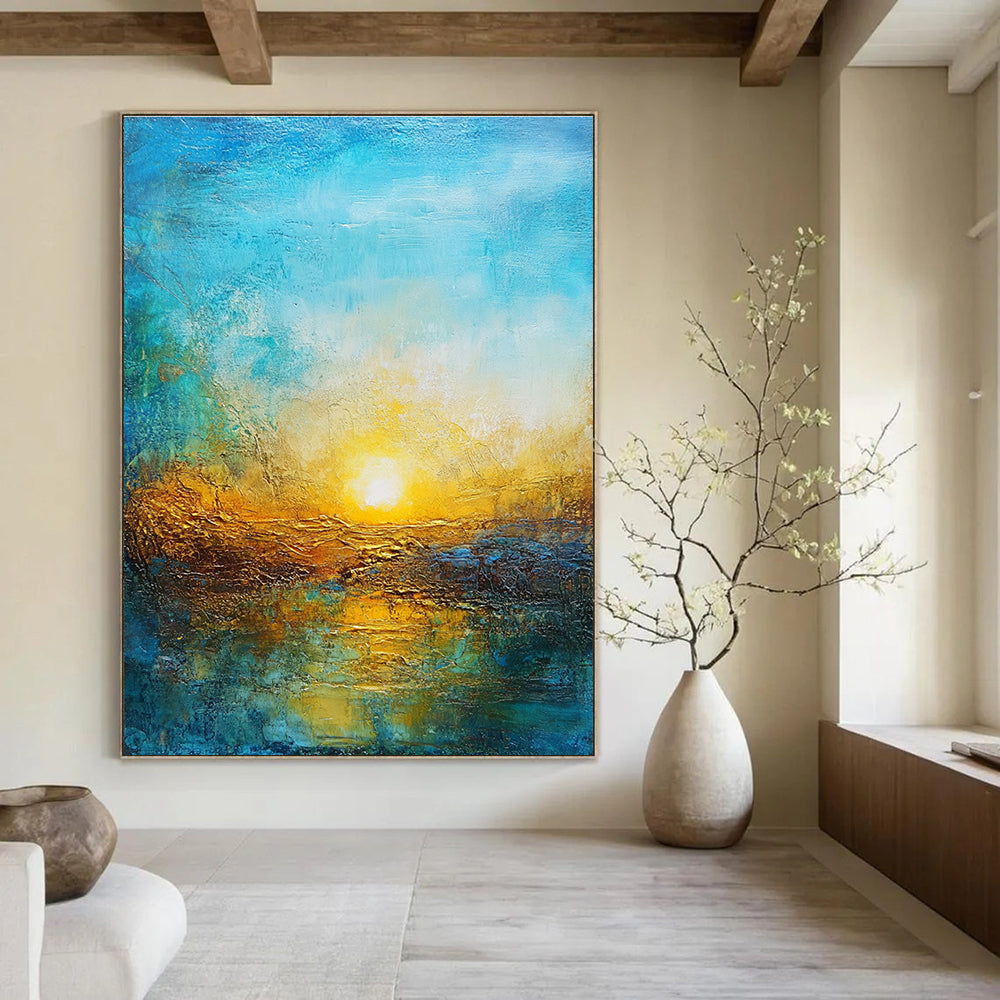 Large abstract painting featuring a vibrant sunset in golden hues and deep blues over a textured landscape symbolizing new beginnings and hope.STSC200