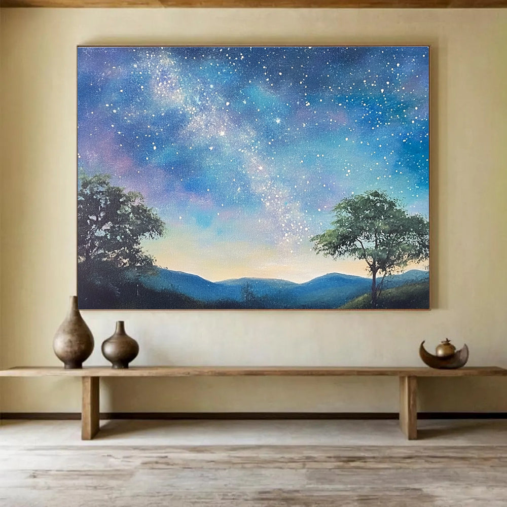 A large abstract painting featuring a serene starry sky with the Milky Way, silhouetted trees on hills, and a fantasy-inspired azure background.SC421