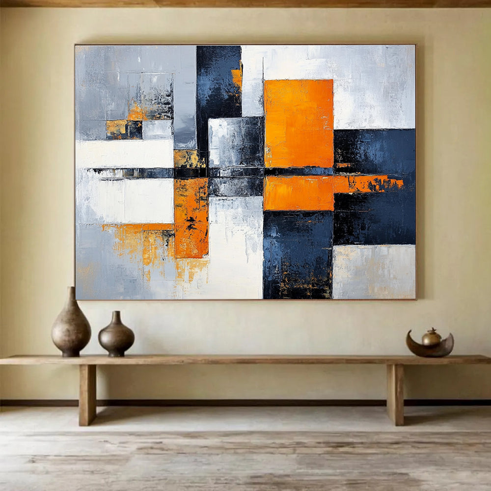 Large abstract painting featuring gray, white, and orange color blocks with a calming cityscape background, offering a sense of harmony and balance.SC100