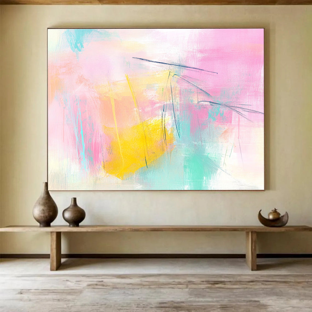 Large abstract painting featuring pink and yellow tones light blue lines and soft shapes creating a dreamy atmosphere with delicate brushstrokes and pastel background.SC211