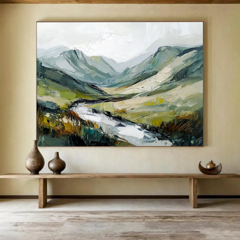 Large abstract painting of an Irish landscape with green and gray mountains flowing river and textured brush strokes against a white sky.SC596