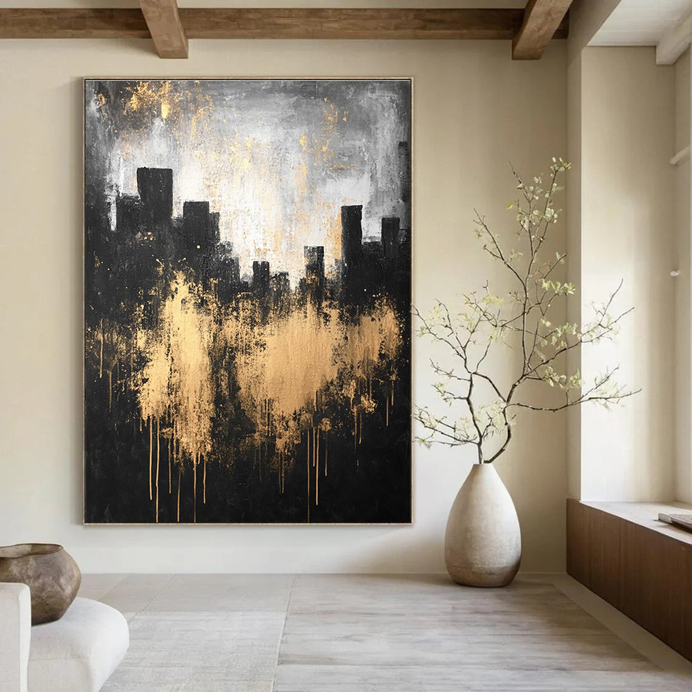 Large abstract painting featuring a city silhouette in dark gray and light gold with textured canvas and atmospheric lighting.STSC216