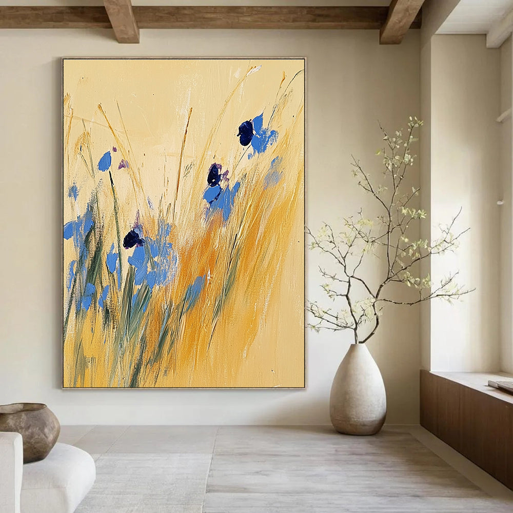 Large abstract painting of tall grass and blue wildflowers on a light yellow background inspired by Joseph Mallord William Turner.STSC336
