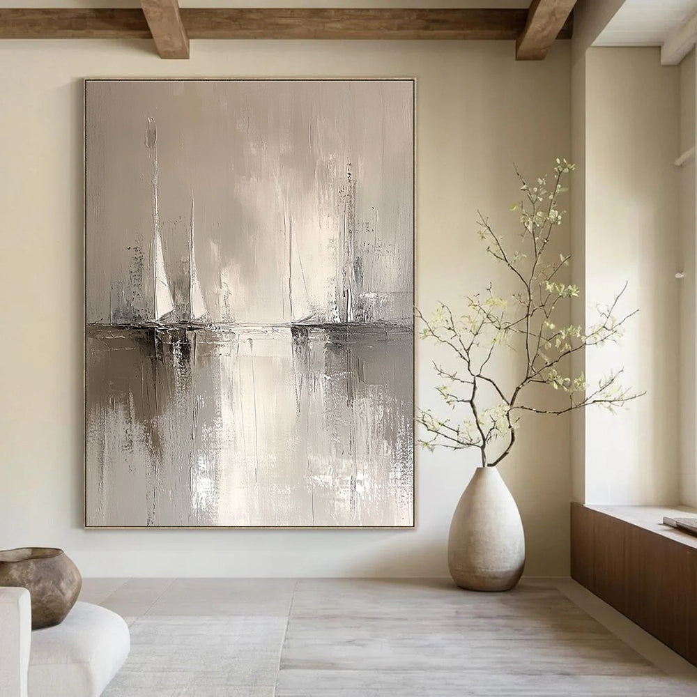 Large abstract painting in minimalist style features sailboats on the horizon with soft water reflections in neutral tones of white and grey.STSC231
