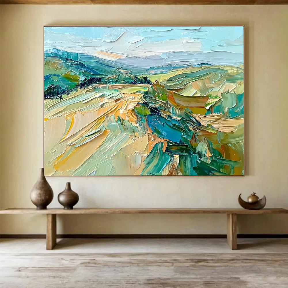 Large abstract oil painting of the French countryside featuring impasto strokes in green, blue, beige, and brown for a natural earthy feel.SC127